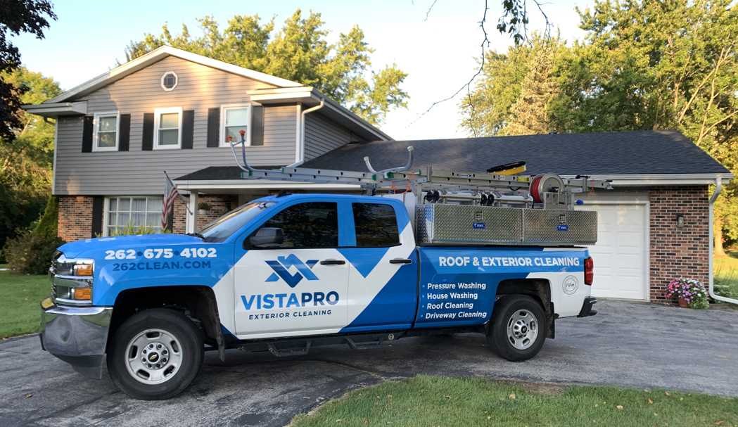 Vista Pro truck in front of a house.