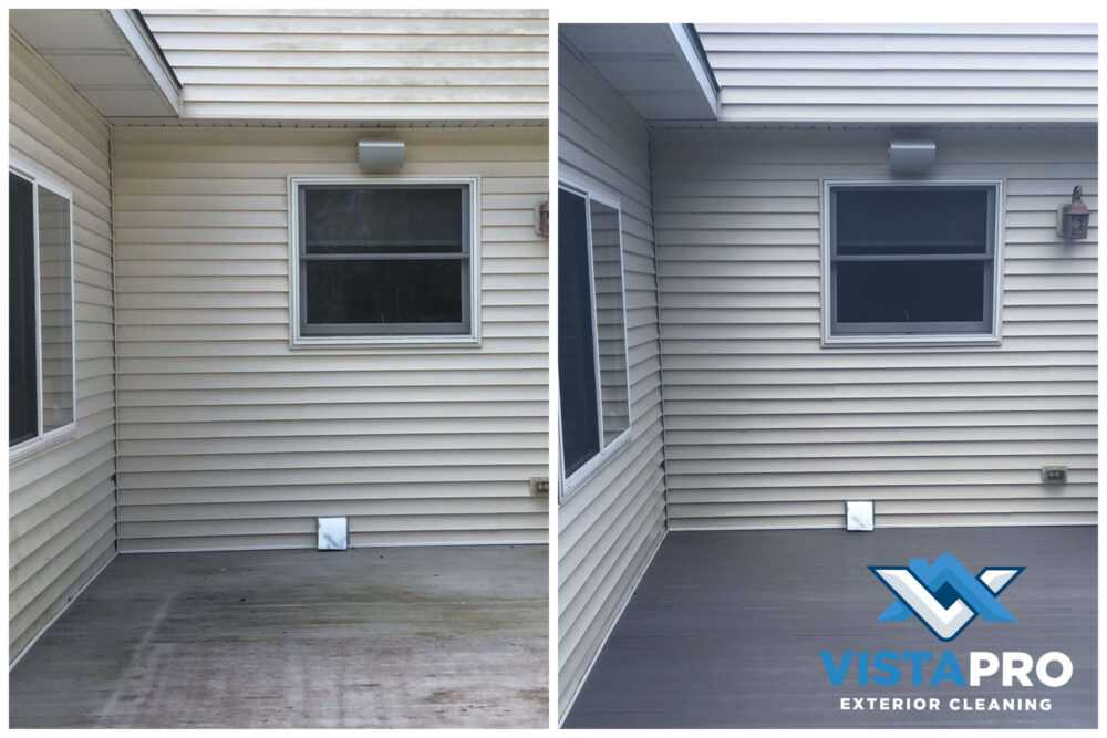 Siding and deck covered in algae in Sheboygan.