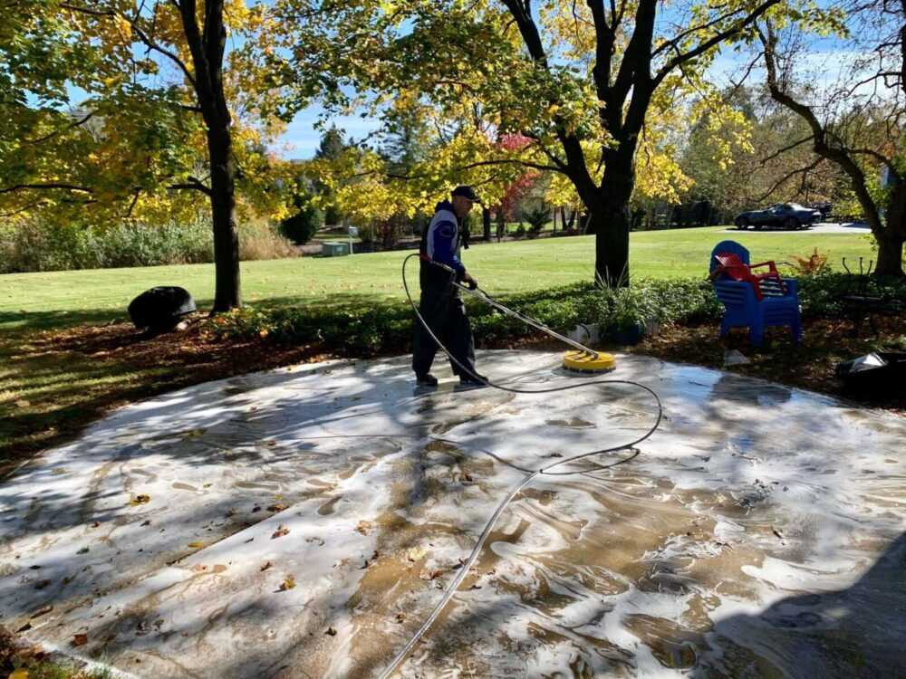 Soapy patio being cleaned.