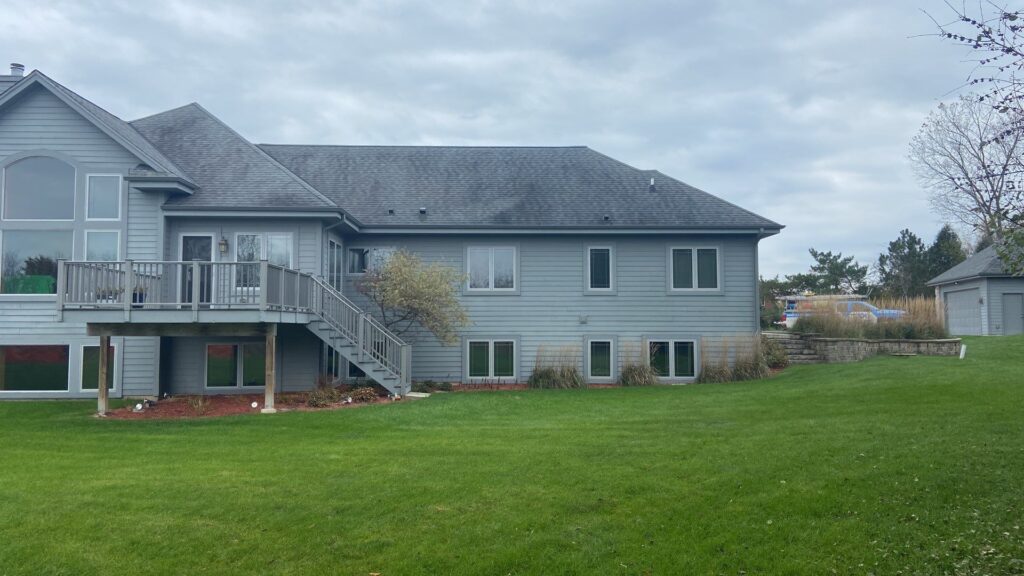 Hardie board house with black streaks on the roof