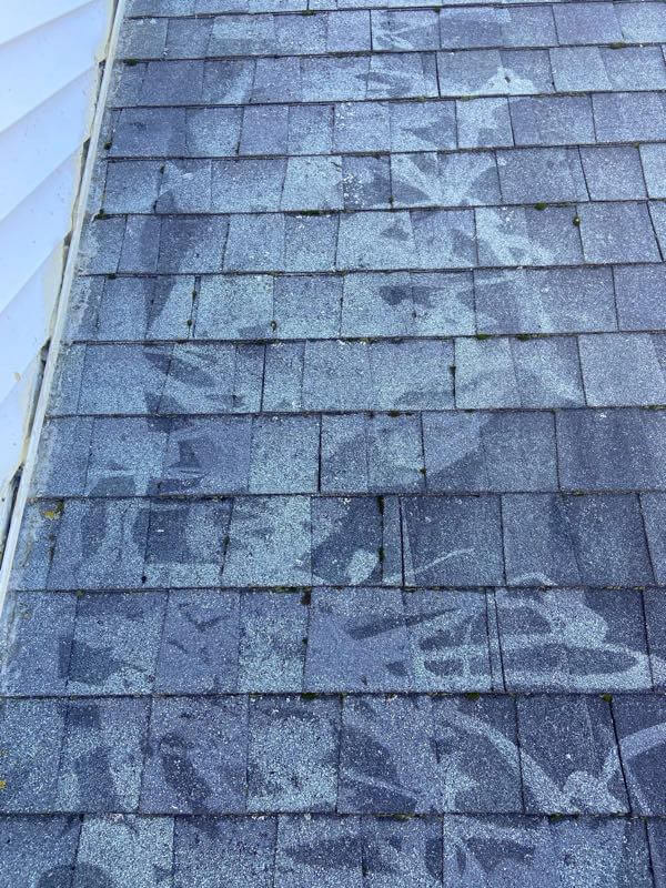 Picture of roof that was pressure washed with high pressure